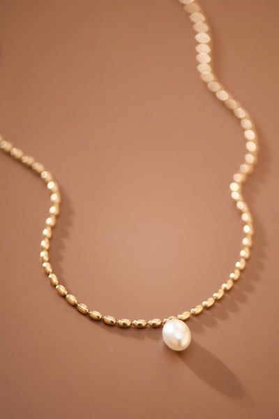 Girl with a Pearl Necklace